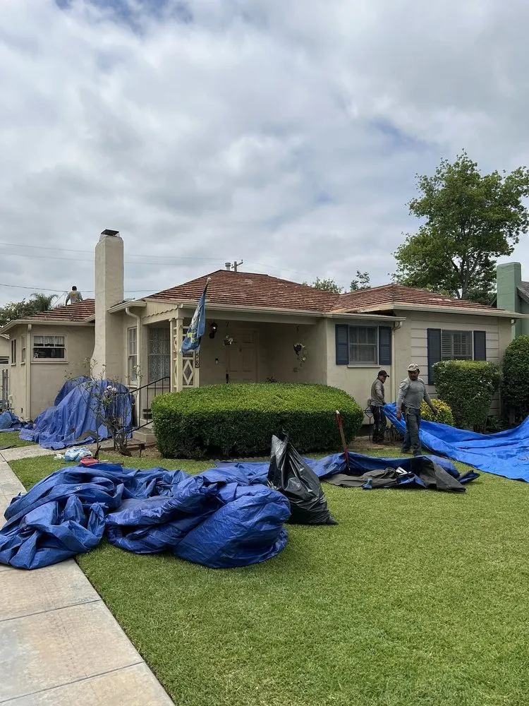 Slide of Manna Roofing Company