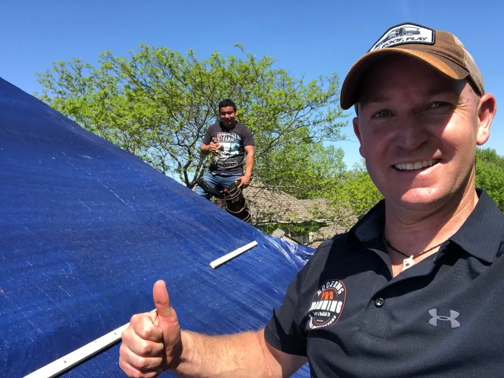 Slide of Manning Roofing