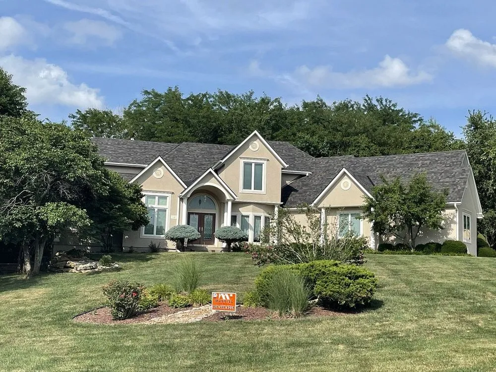 Slide of Manning Roofing