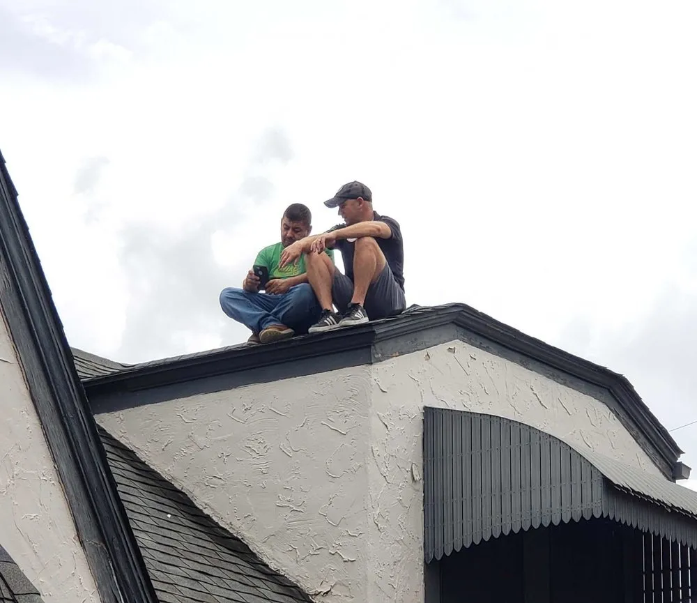 Slide of Manning Roofing