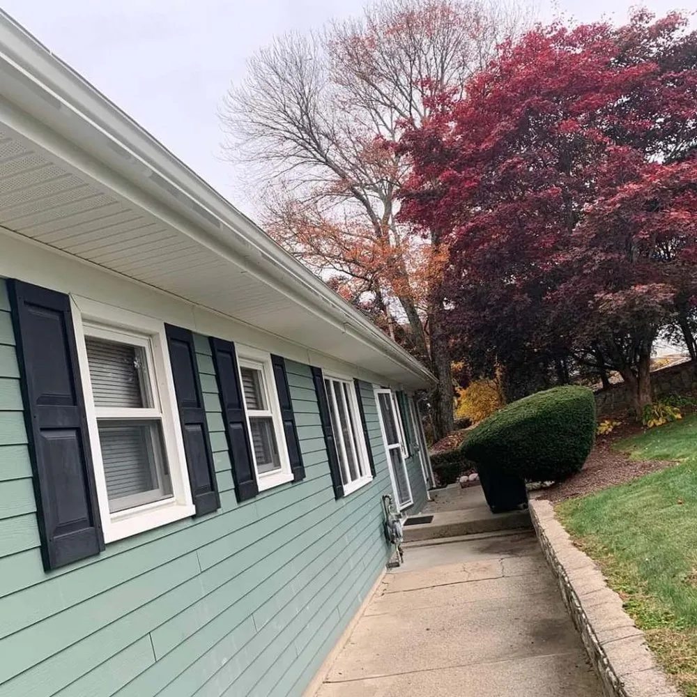 Slide of Manny Gutter Services