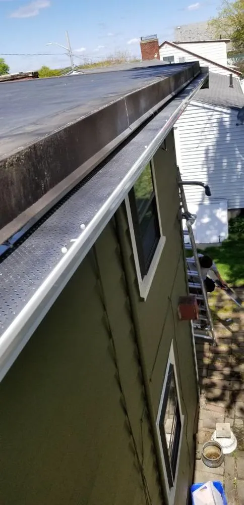 Slide of Manny Gutter Services