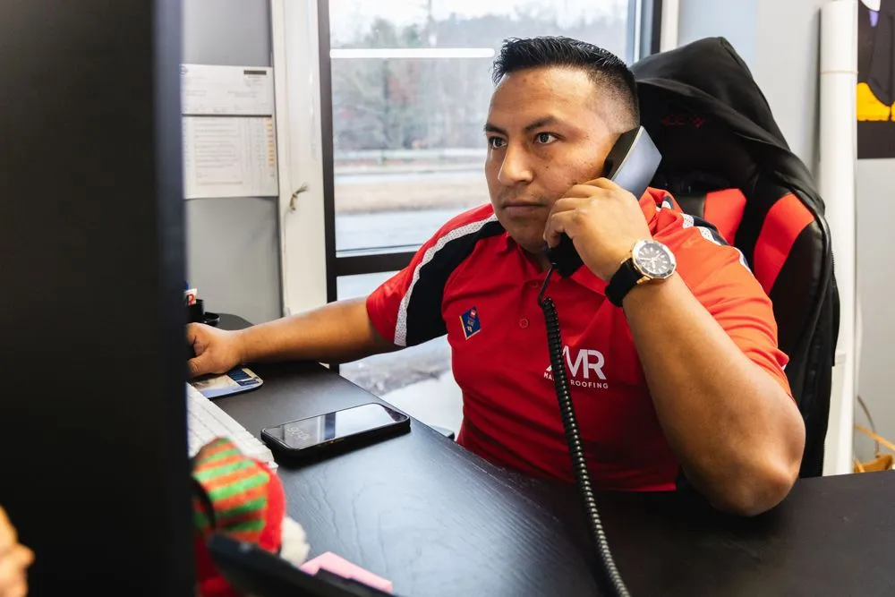 Slide of Manny Roofing