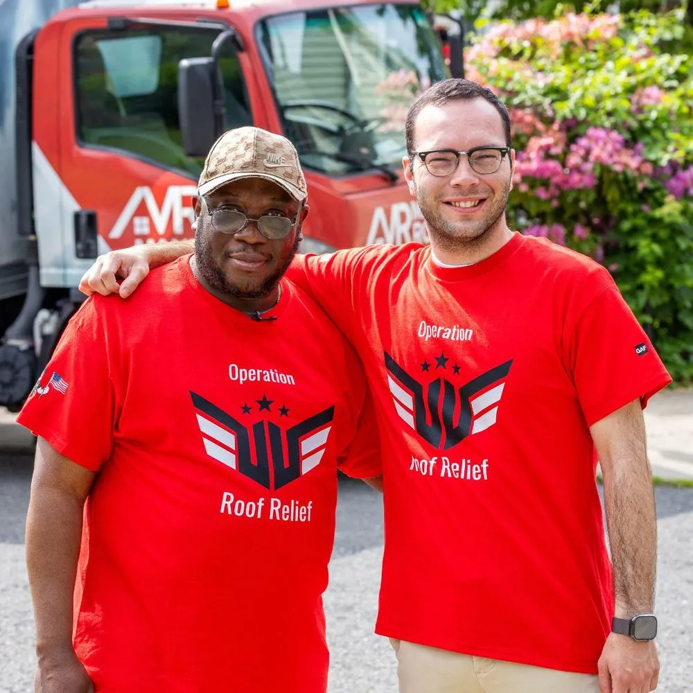 Slide of Manny Roofing