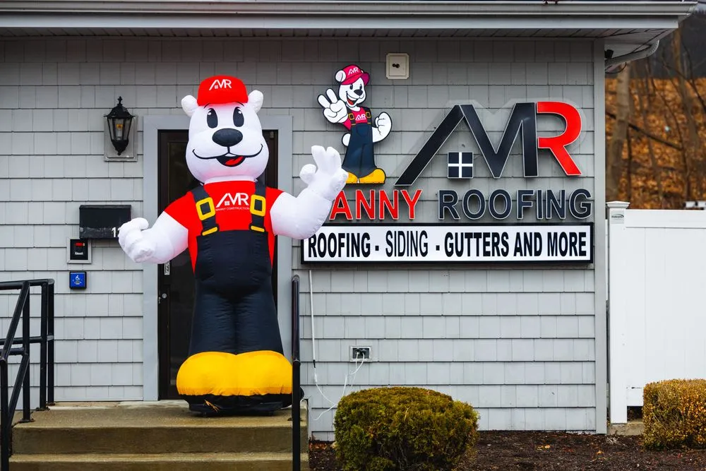 Slide of Manny Roofing