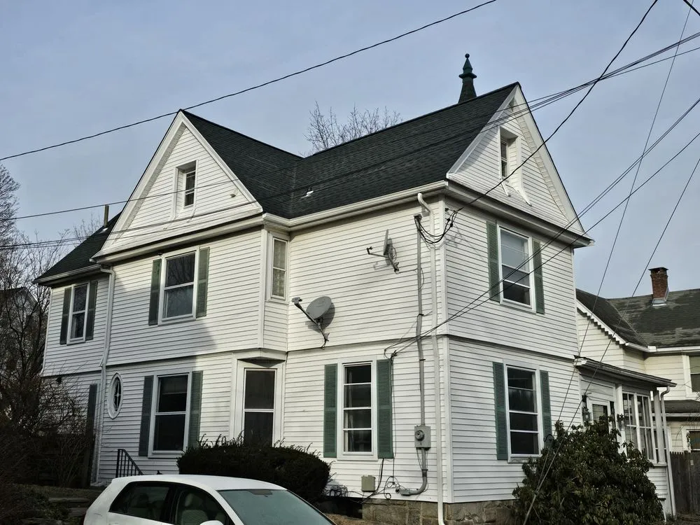 Slide of Manny Roofing