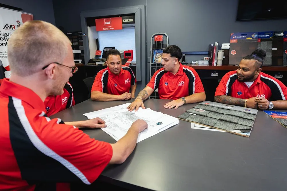 Slide of Manny Roofing