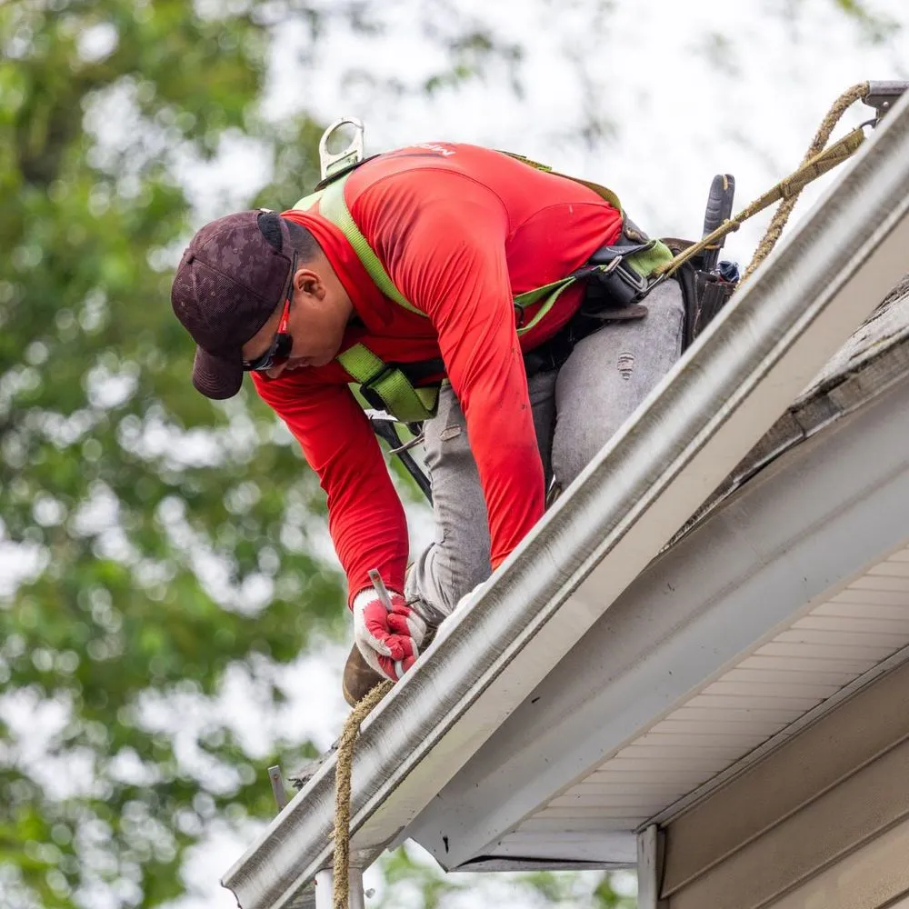 Slide of Manny Roofing