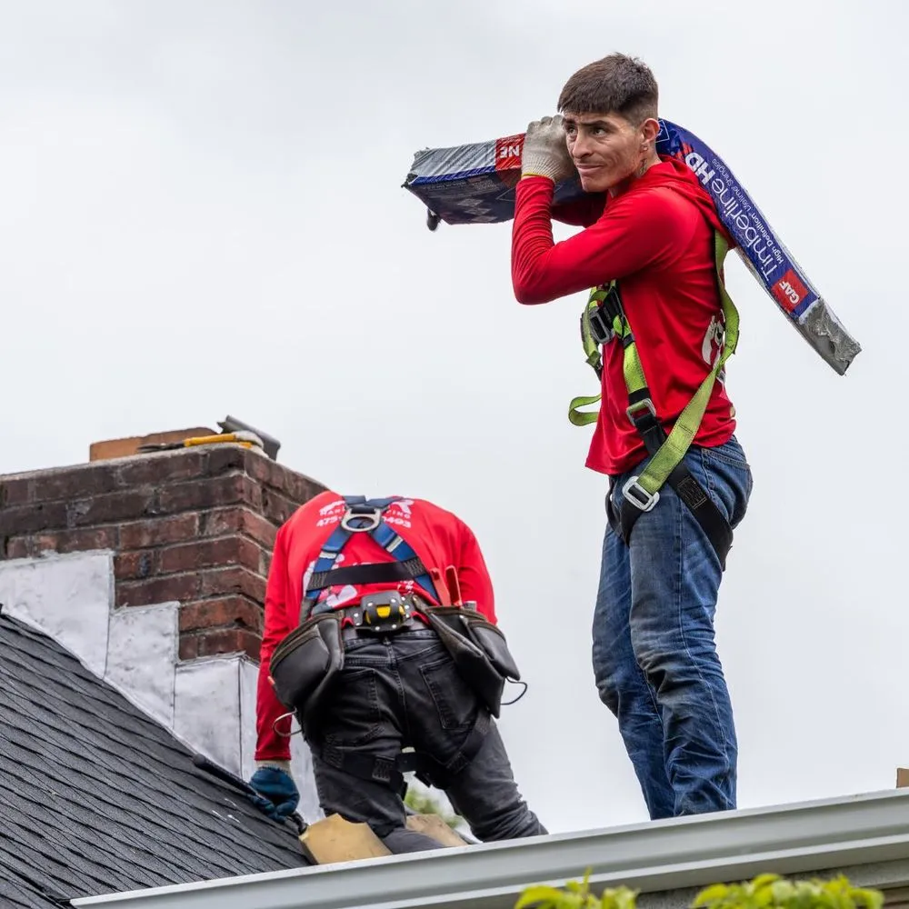 Slide of Manny Roofing