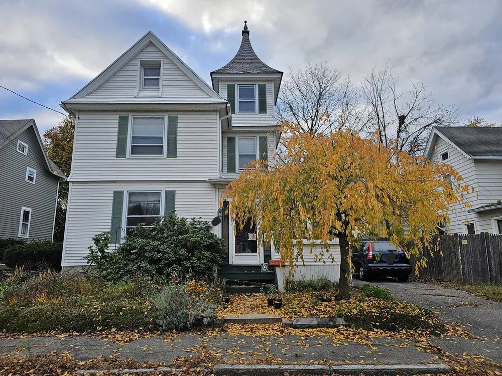 Slide of Manny Roofing