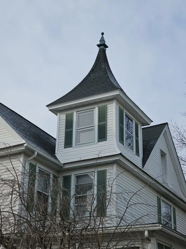 Slide of Manny Roofing