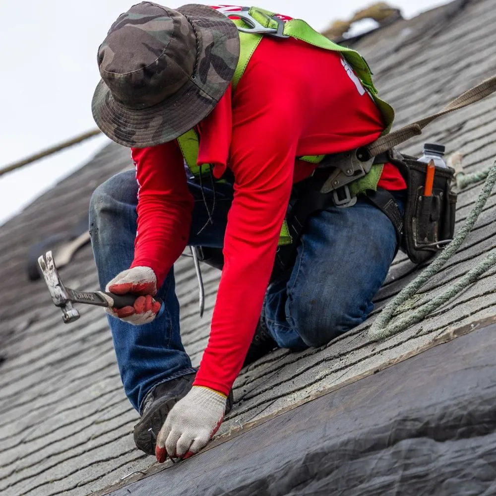 Slide of Manny Roofing