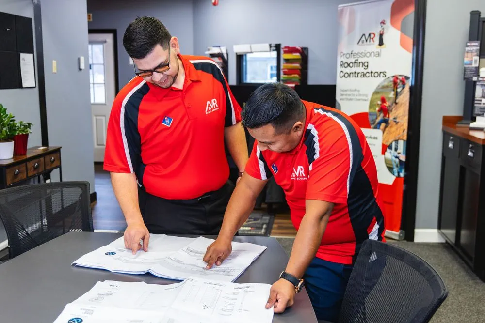 Slide of Manny Roofing