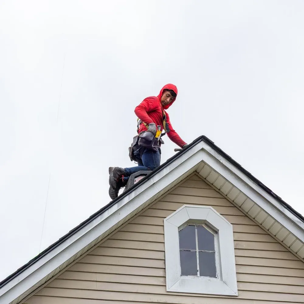 Slide of Manny Roofing
