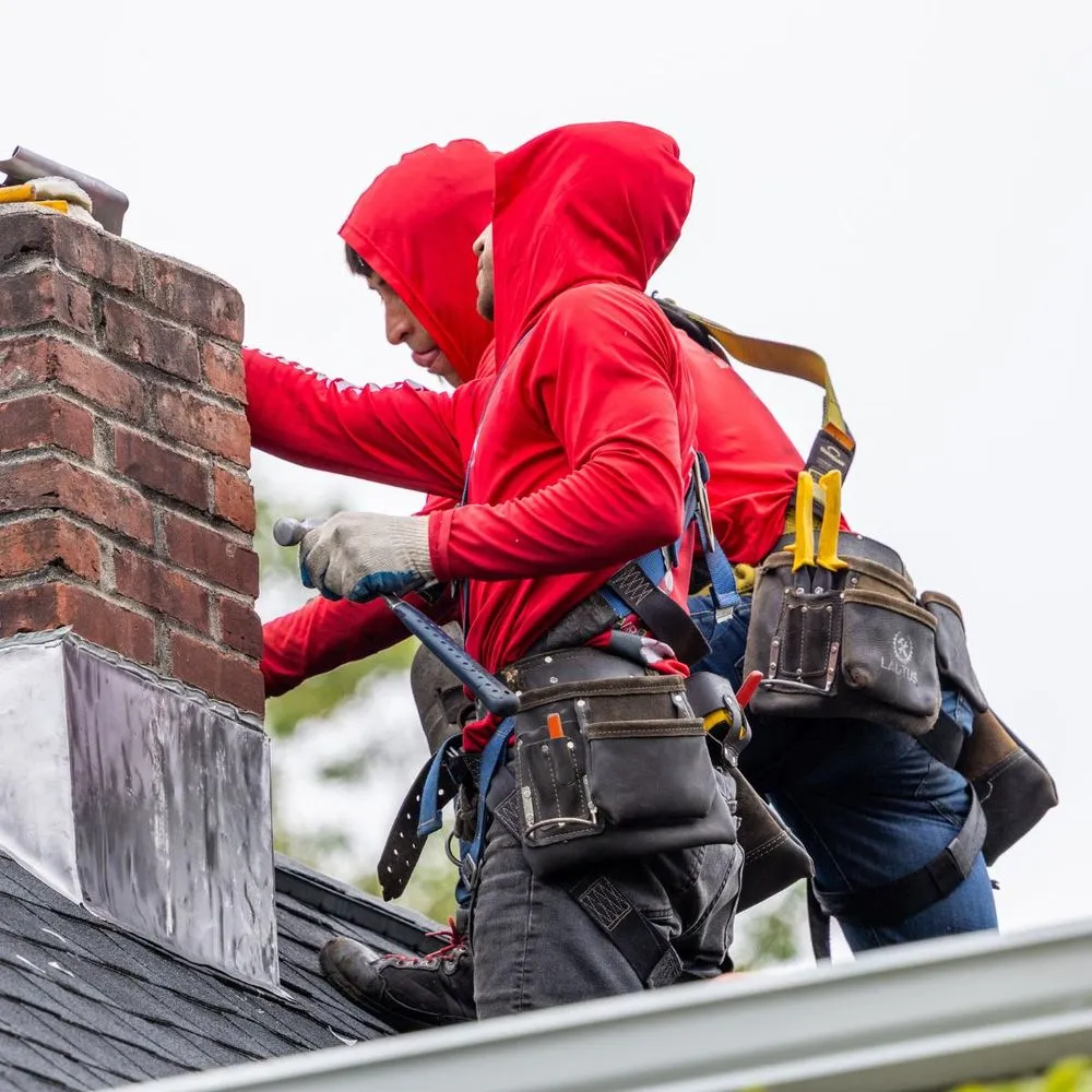 Slide of Manny Roofing