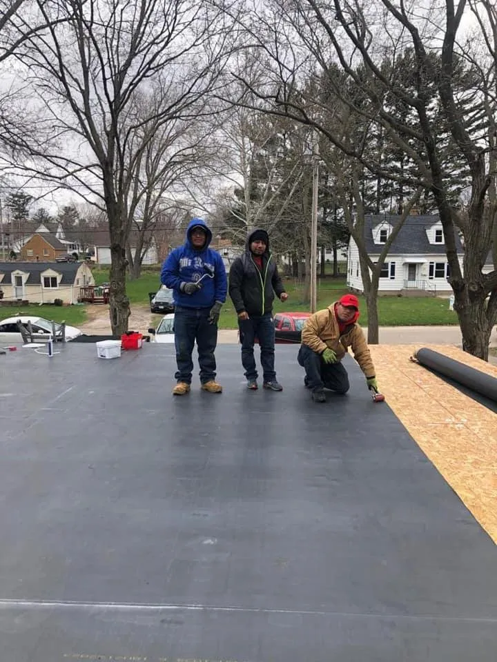 Slide of Manny's Eastern Iowa Roofing and Construction