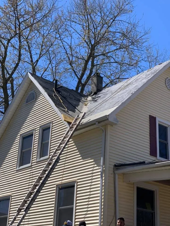 Slide of Manny's Eastern Iowa Roofing and Construction