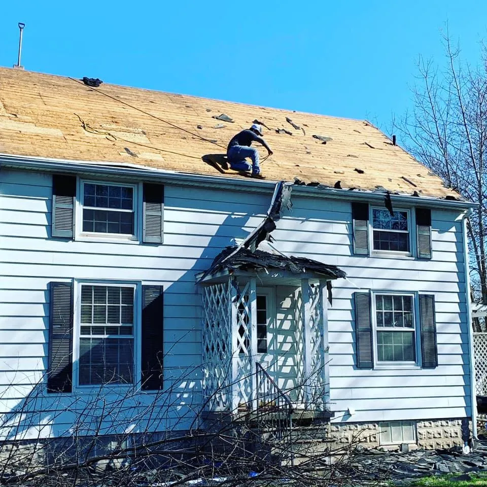 Slide of Manny's Eastern Iowa Roofing and Construction