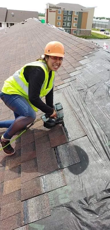 Slide of Manny's Eastern Iowa Roofing and Construction