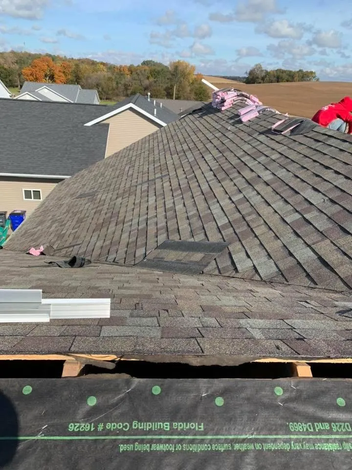 Slide of Manny's Eastern Iowa Roofing and Construction