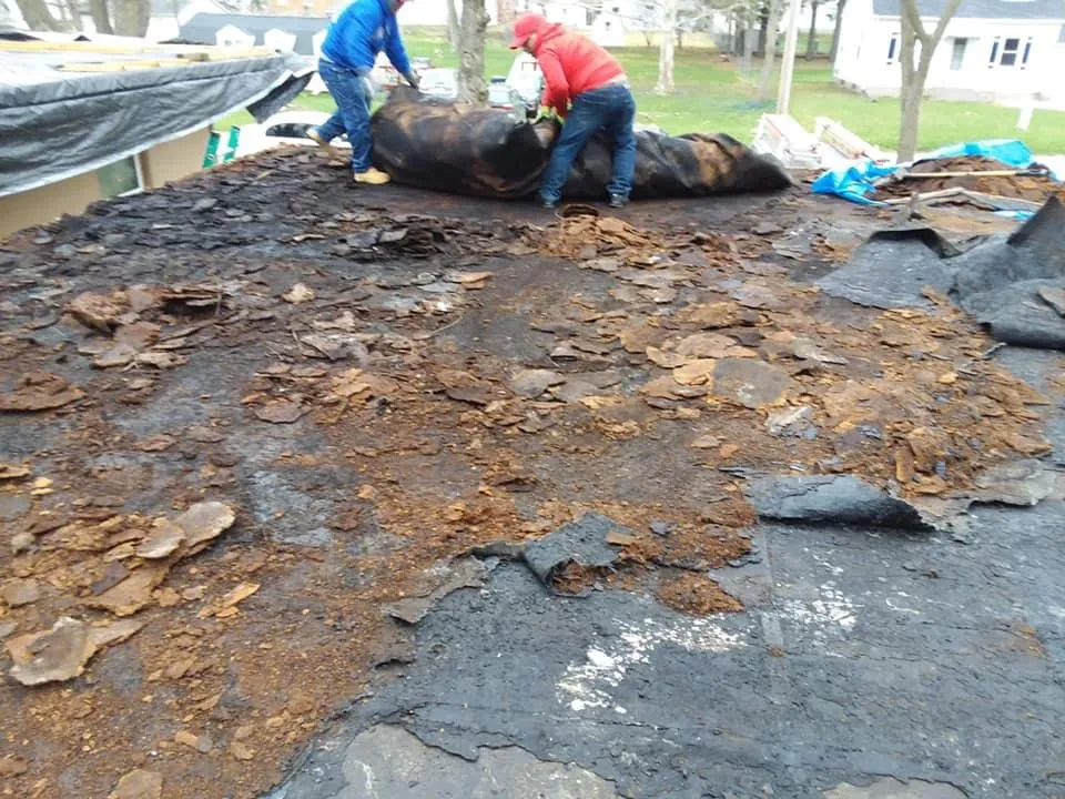 Slide of Manny's Eastern Iowa Roofing and Construction