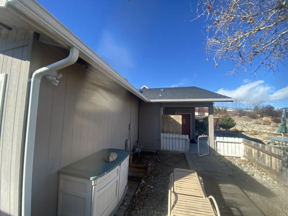 Slide of Manny's Metal Roofing