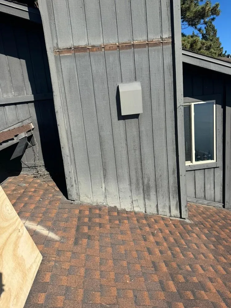 Slide of Manny's Metal Roofing