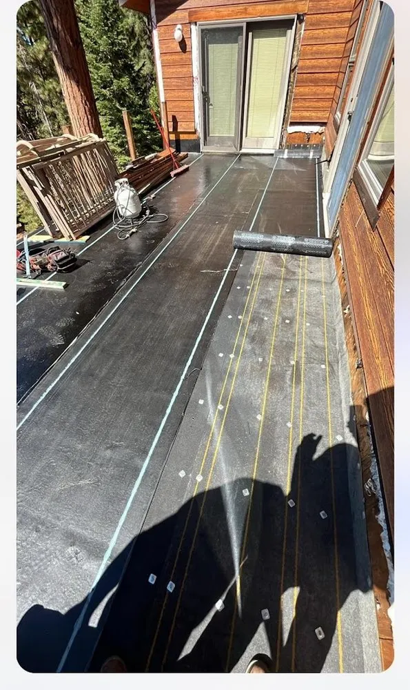 Slide of Manny's Metal Roofing