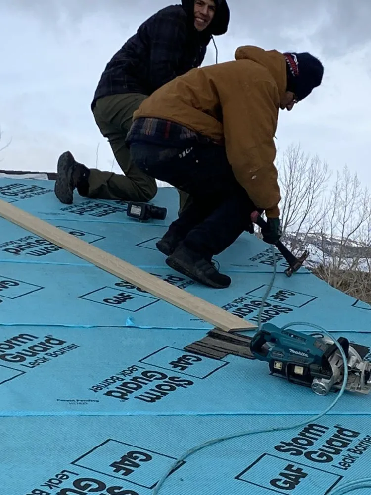 Slide of Manny's Metal Roofing