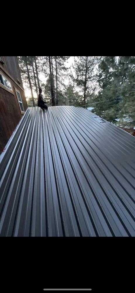 Slide of Mannys Metal Roofing