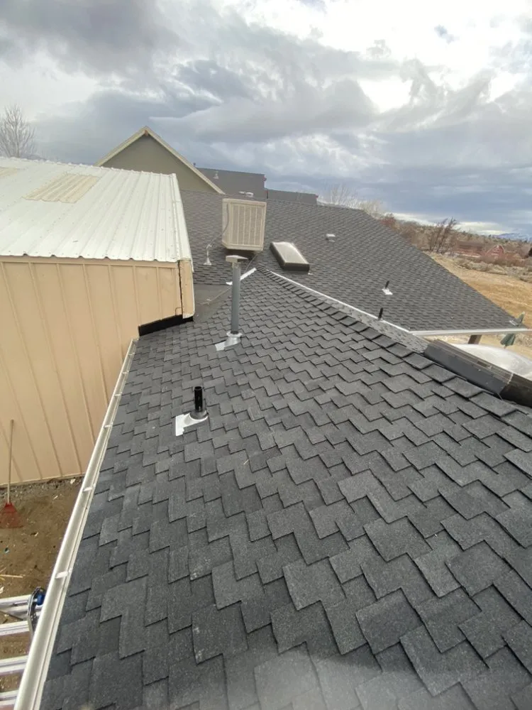 Slide of Mannys Metal Roofing