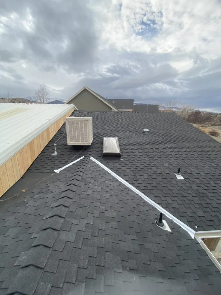 Slide of Mannys Metal Roofing