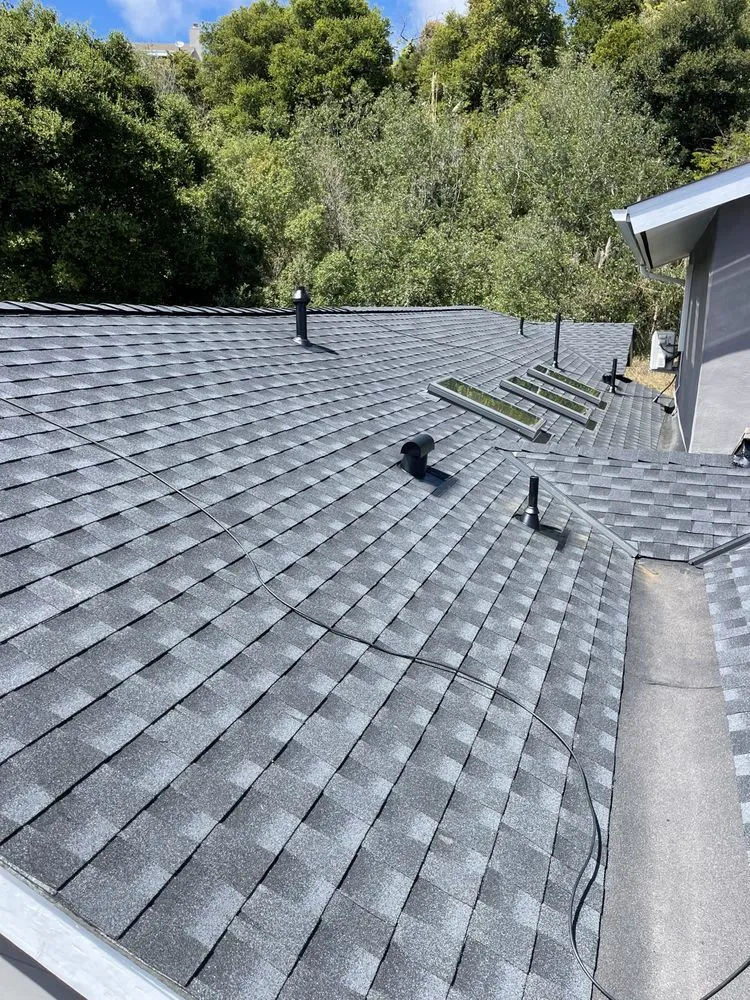 Slide of Manny's Roofing Inc