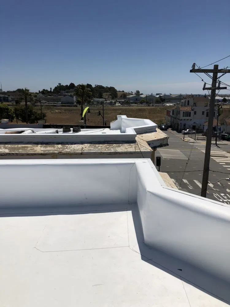 Slide of Manny's Roofing Inc