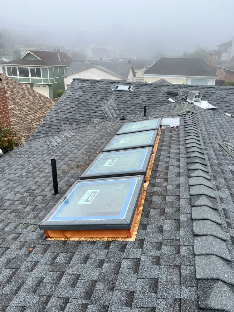 Slide of Manny's Roofing Inc