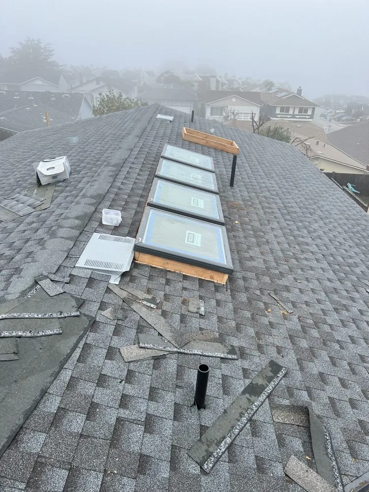 Slide of Manny's Roofing Inc