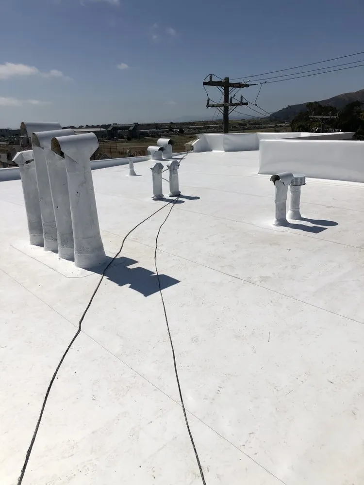 Slide of Manny's Roofing Inc