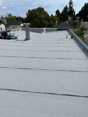 Manny's Roofing Inc Logo