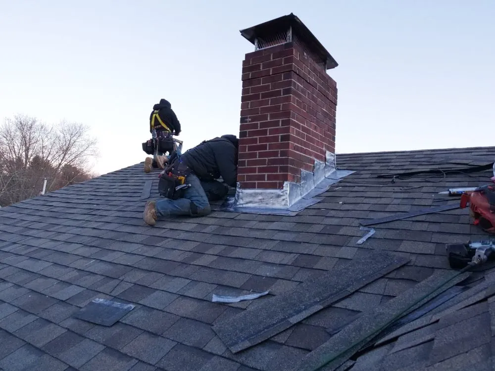 Slide of Manny's Roofing