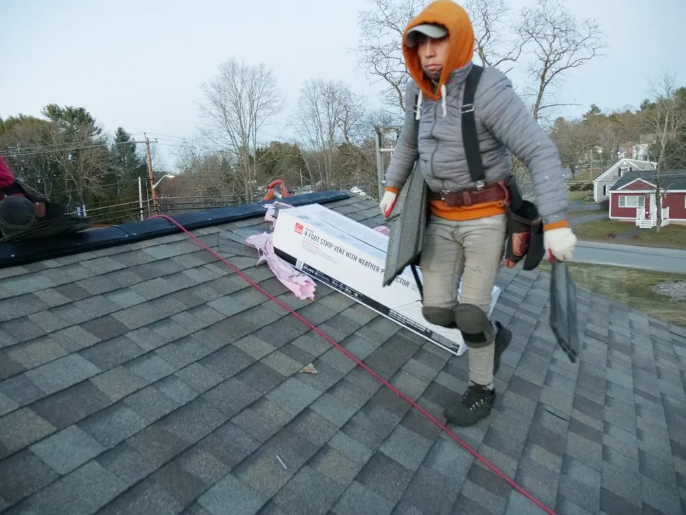 Slide of Manny's Roofing