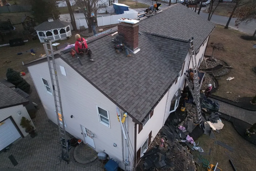 Slide of Manny's Roofing