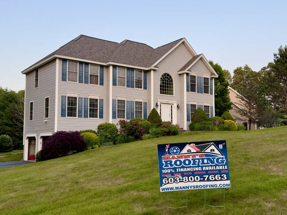 Slide of Manny's Roofing