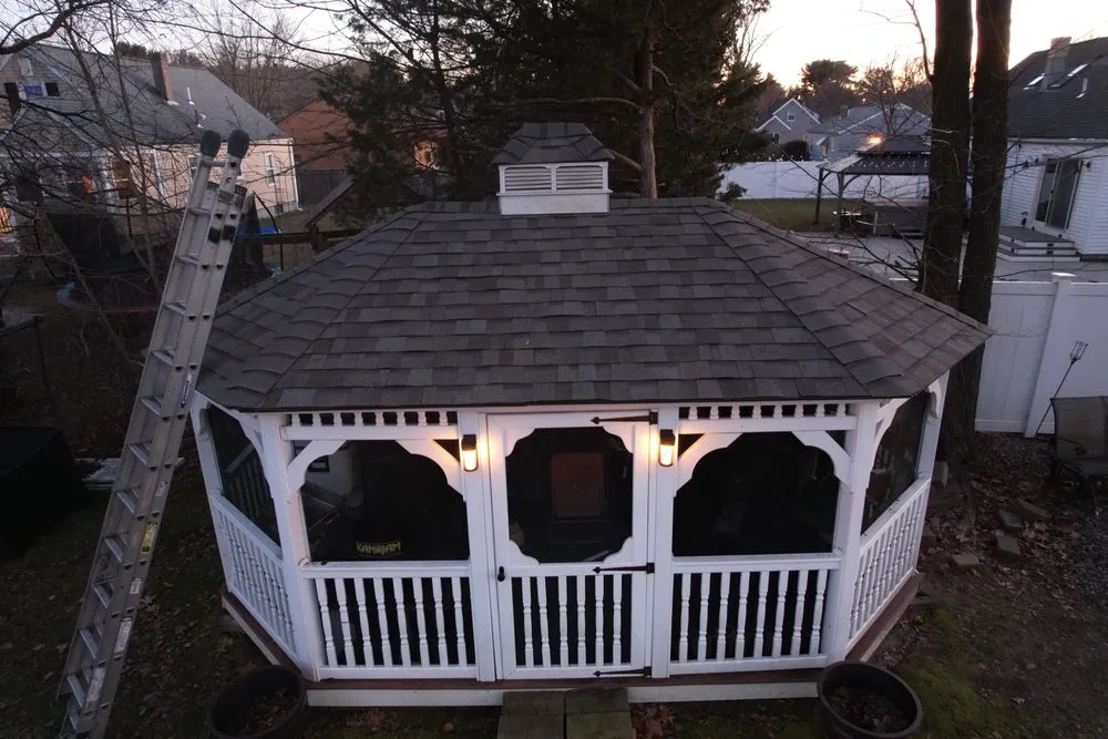 Slide of Manny's Roofing