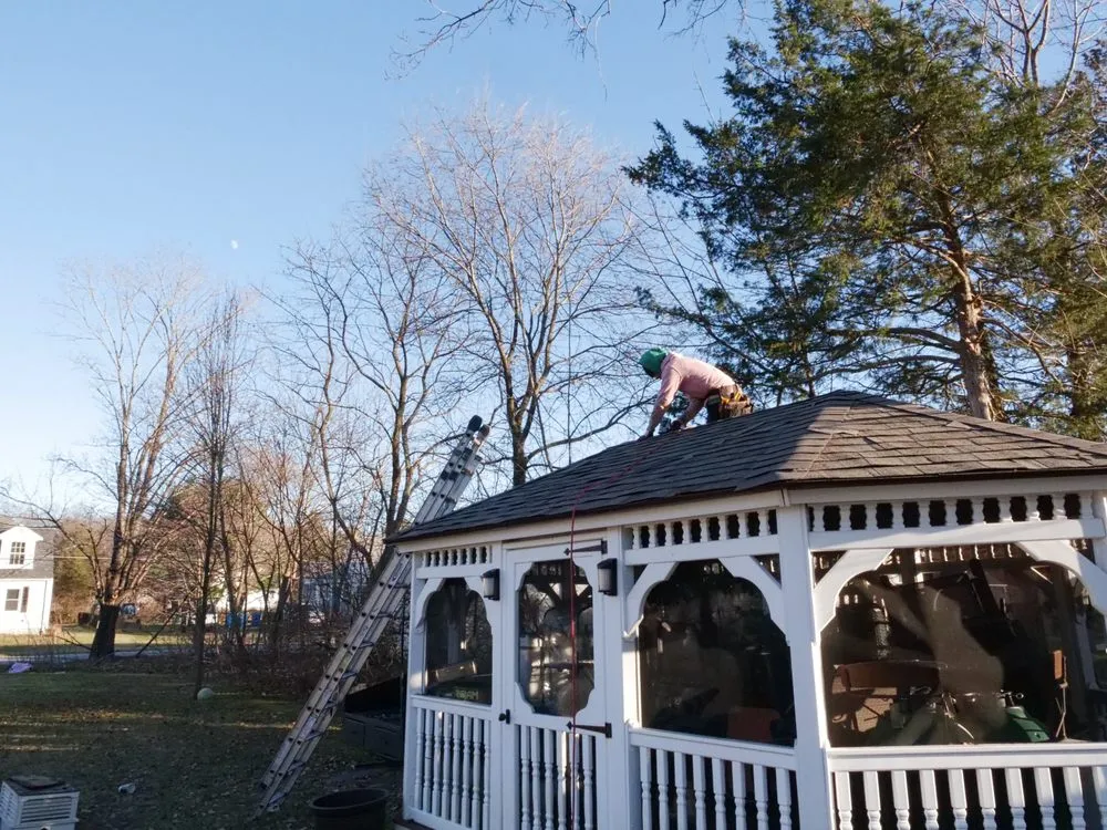 Slide of Manny's Roofing