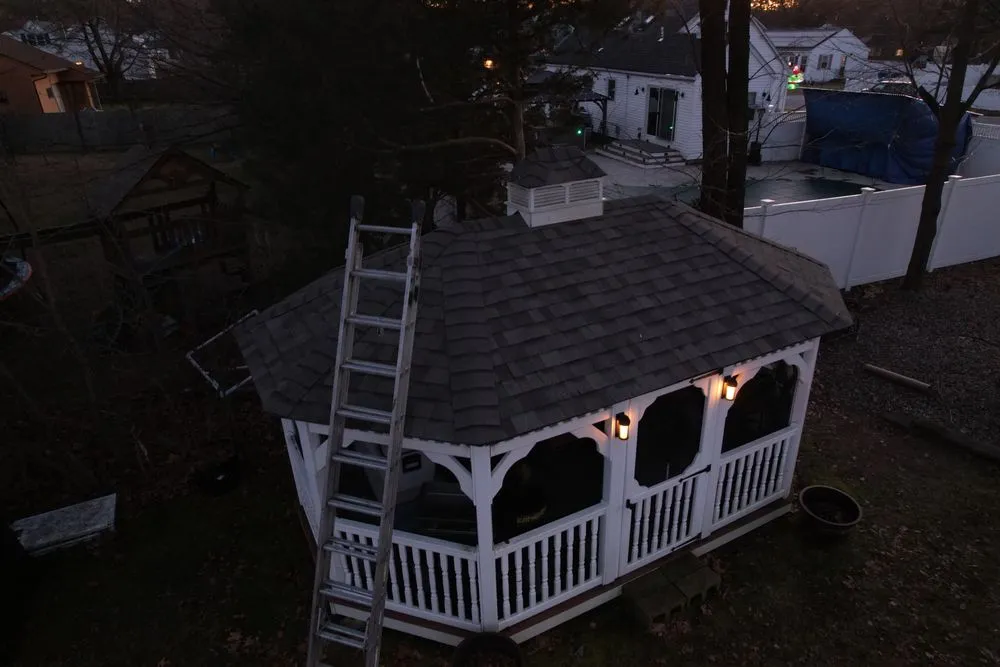 Slide of Manny's Roofing