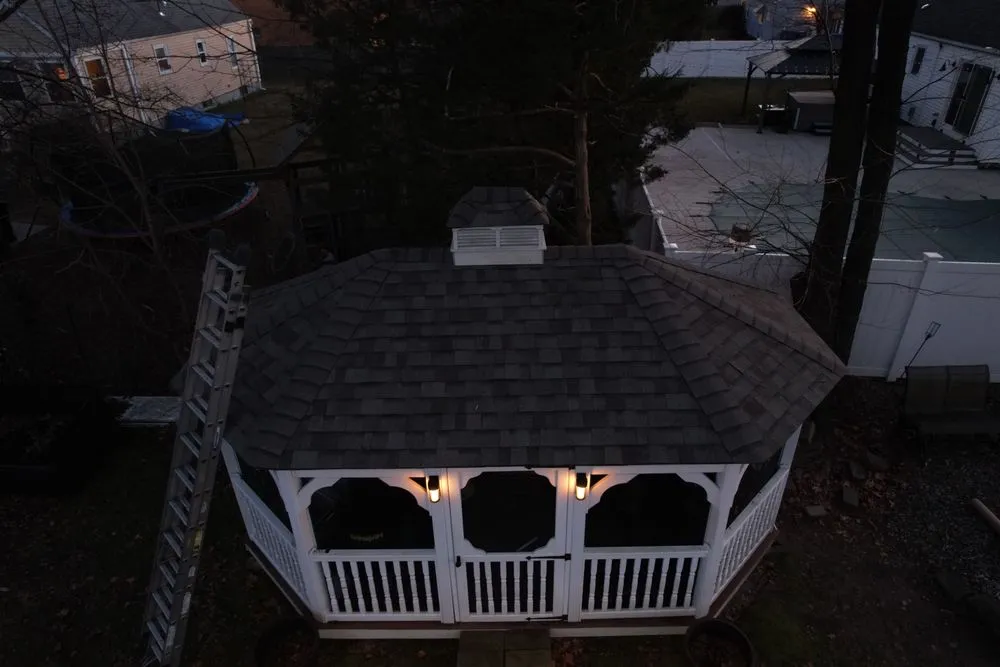 Slide of Manny's Roofing