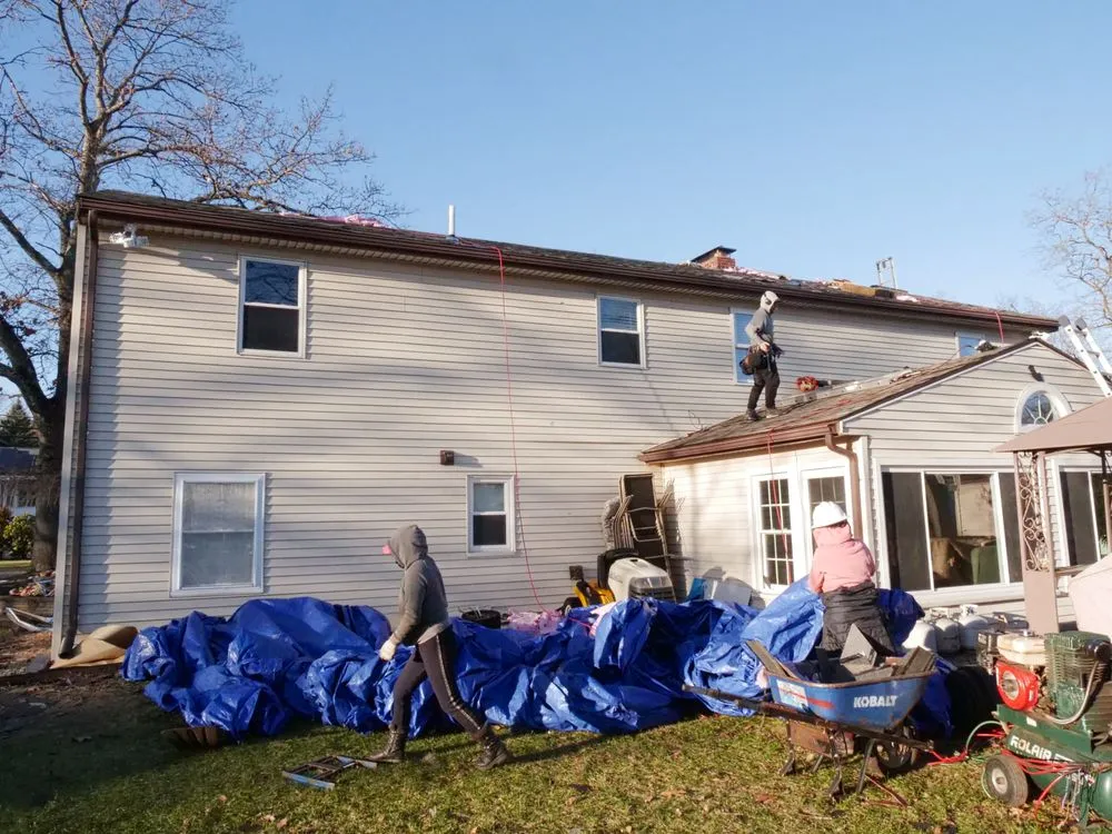 Slide of Manny's Roofing