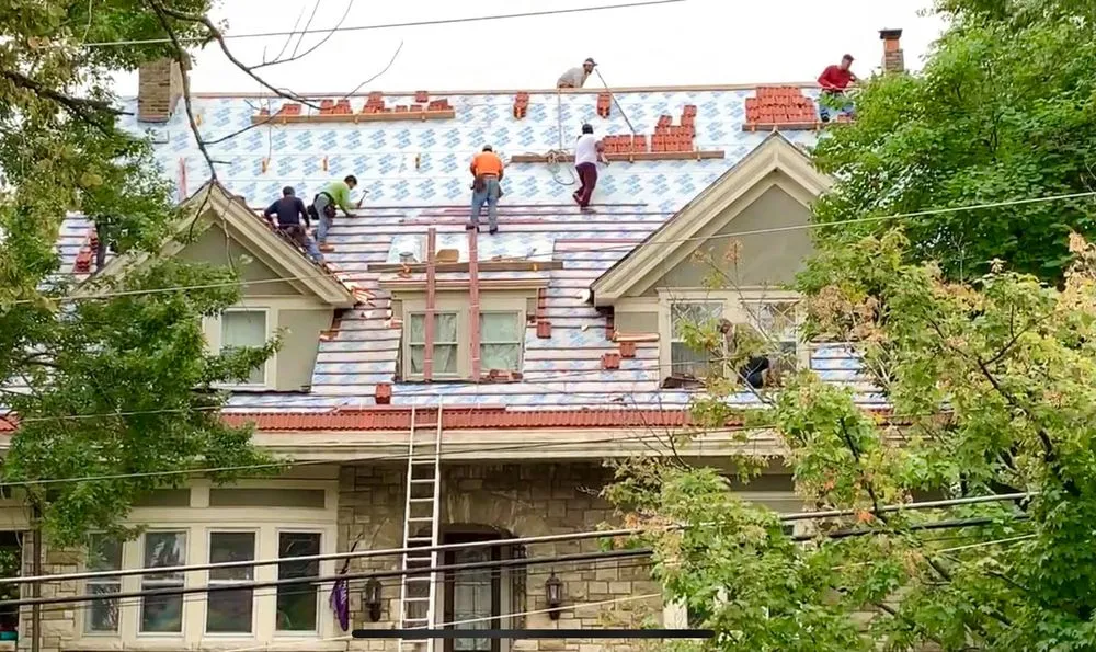 Slide of Manpower Roofing & Construction