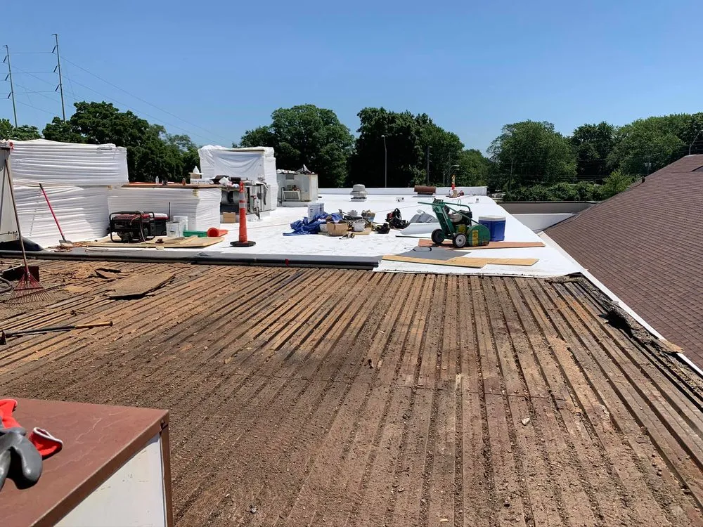 Slide of Manpower Roofing & Construction