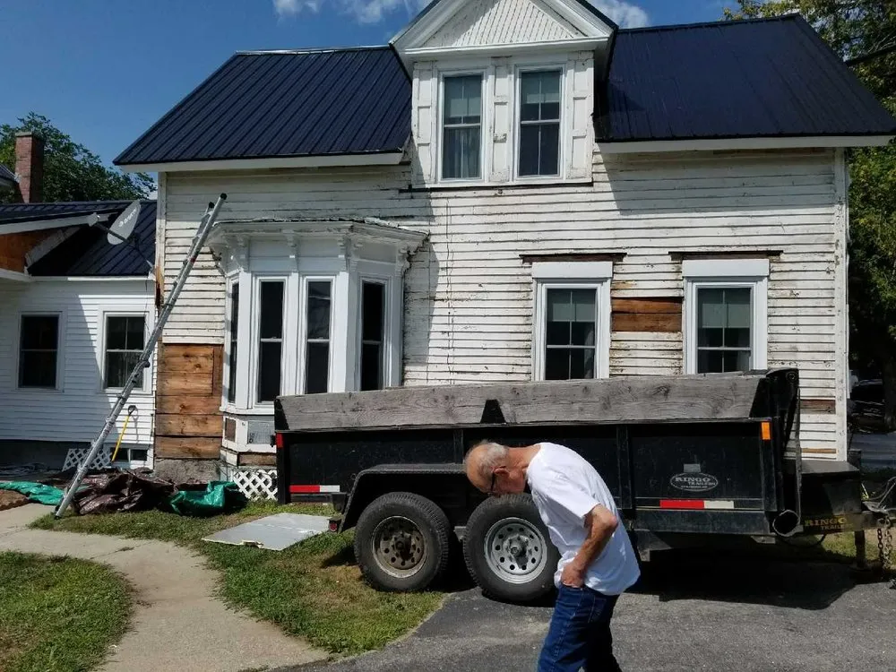 Slide of Mansir's Roofing & Siding